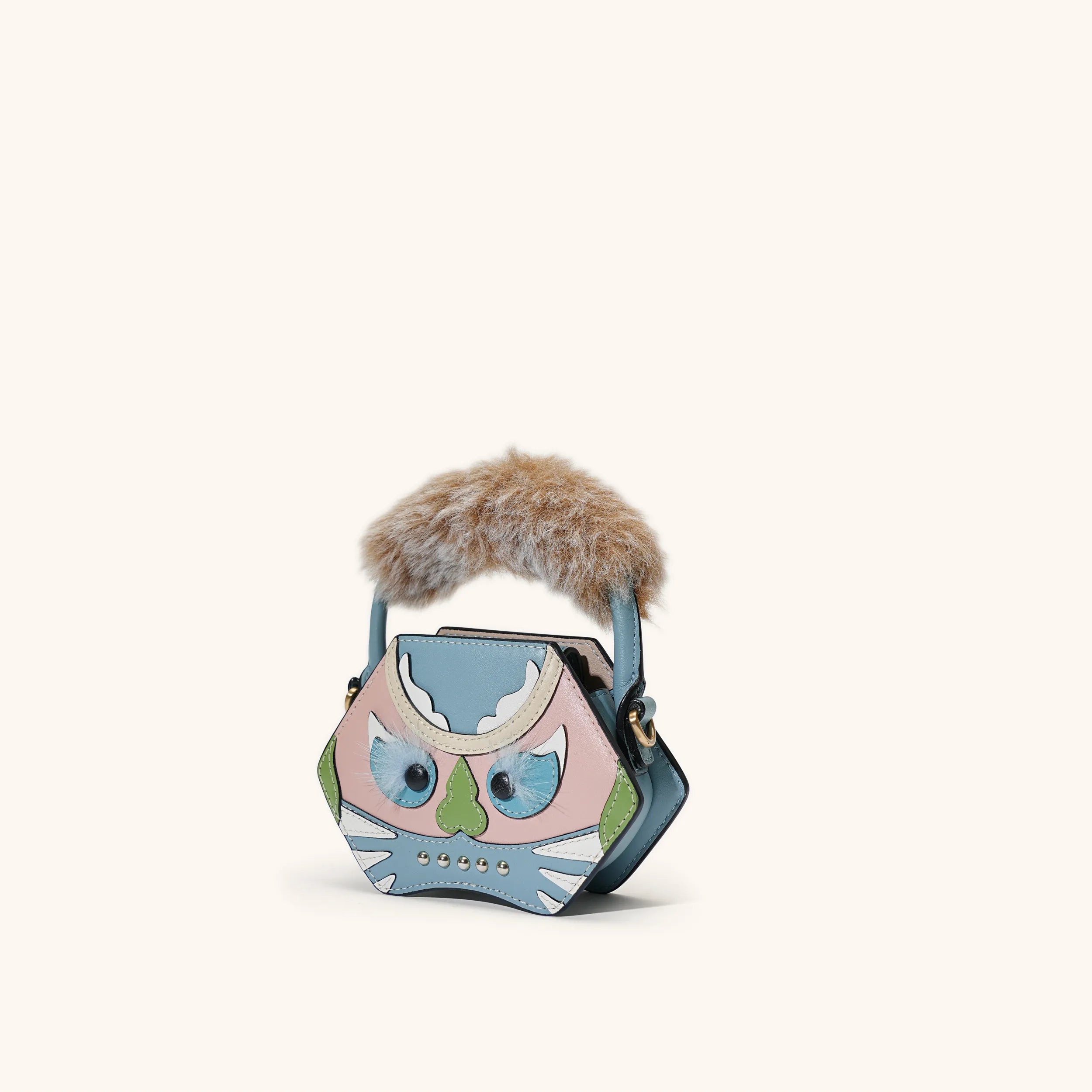 side view of the bampo tiger pop mini purse