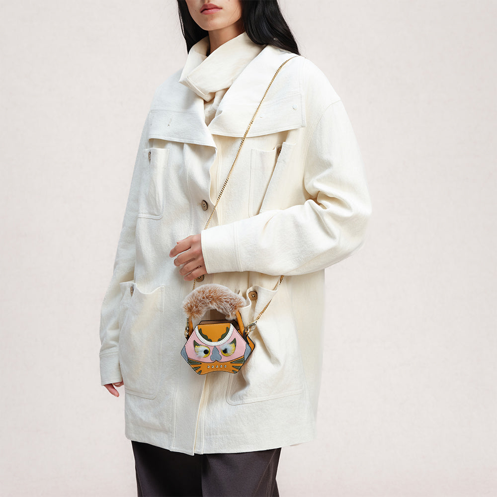 Bampo tiger pop mini purse in yellow on Model 6