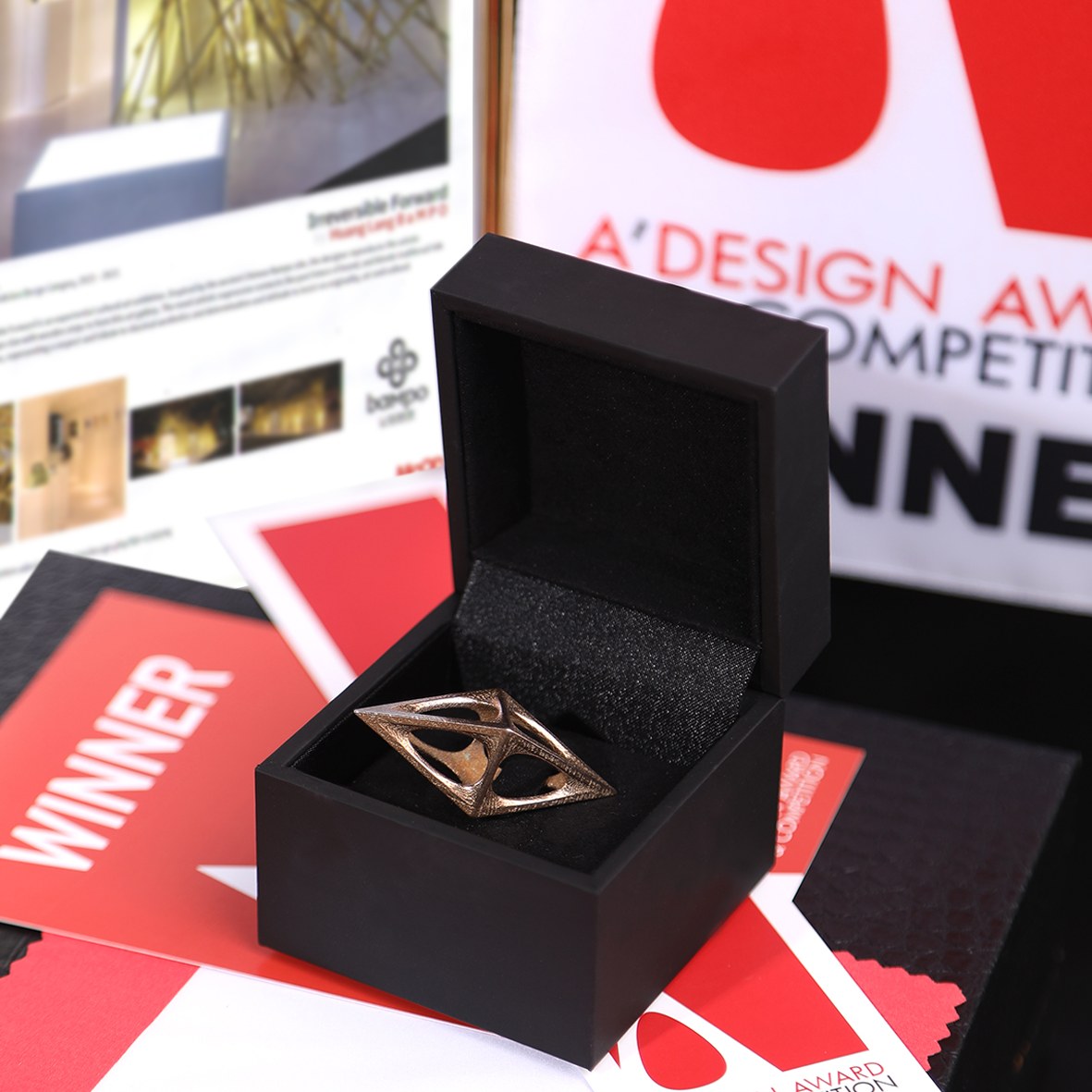 Bampo receiving the A’Design Award