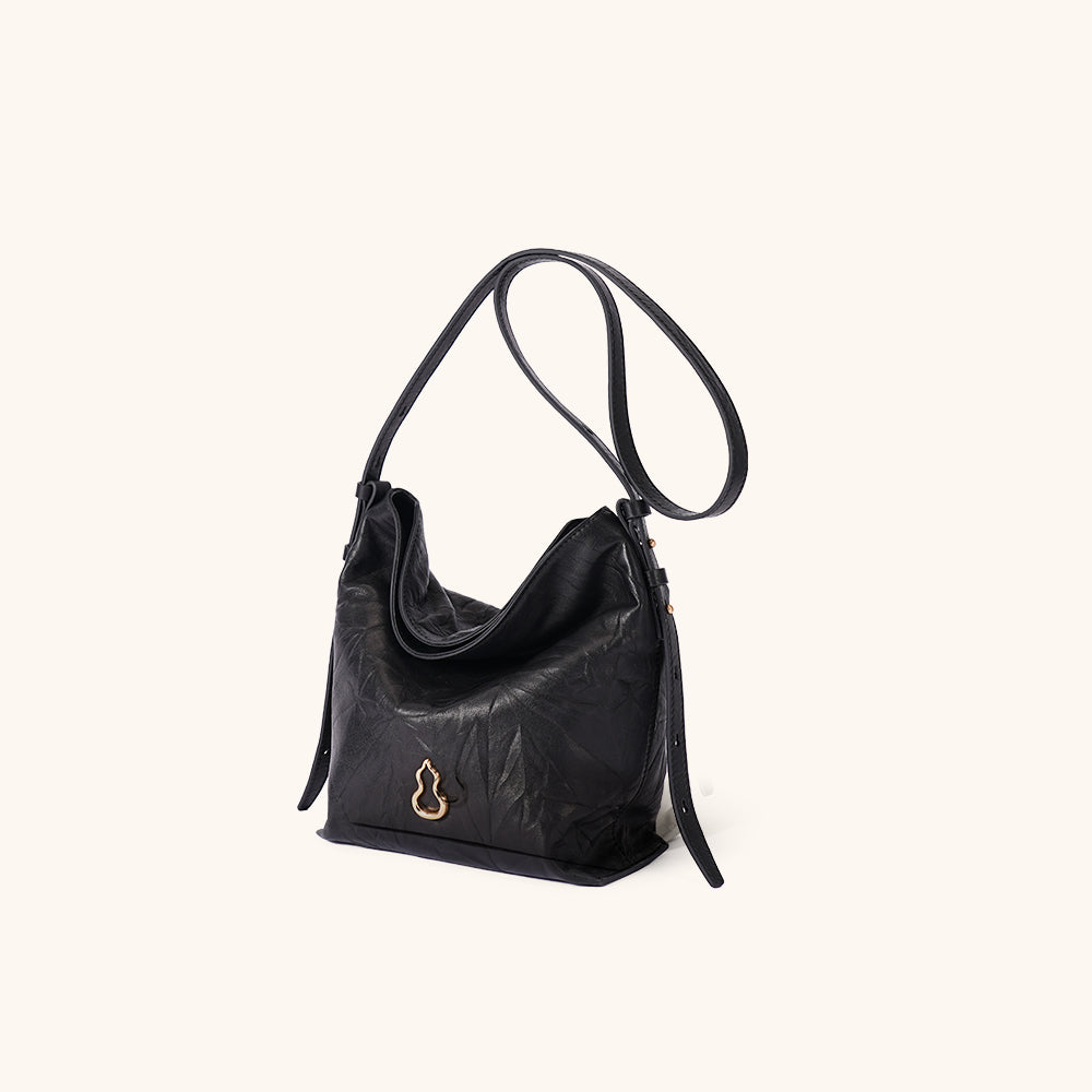 Side View of the Bampo Flow Bucket Bag