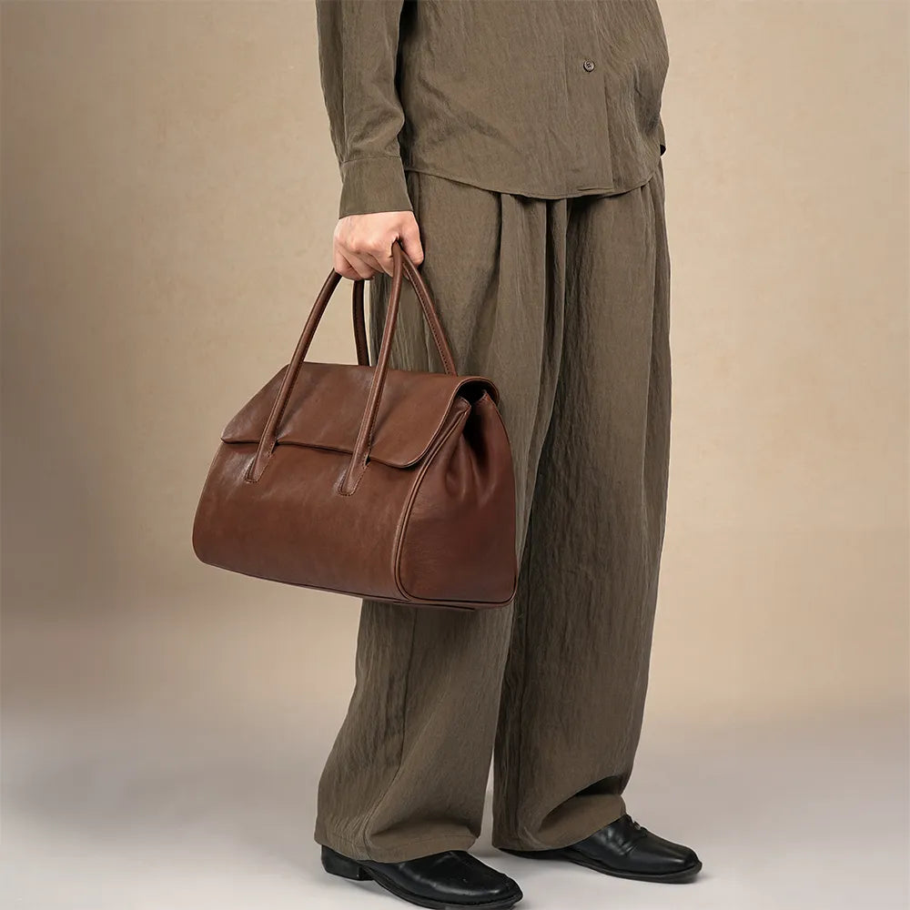 Bampo Fulfill Flap Tote on Model 1#color_hazelnut-brown