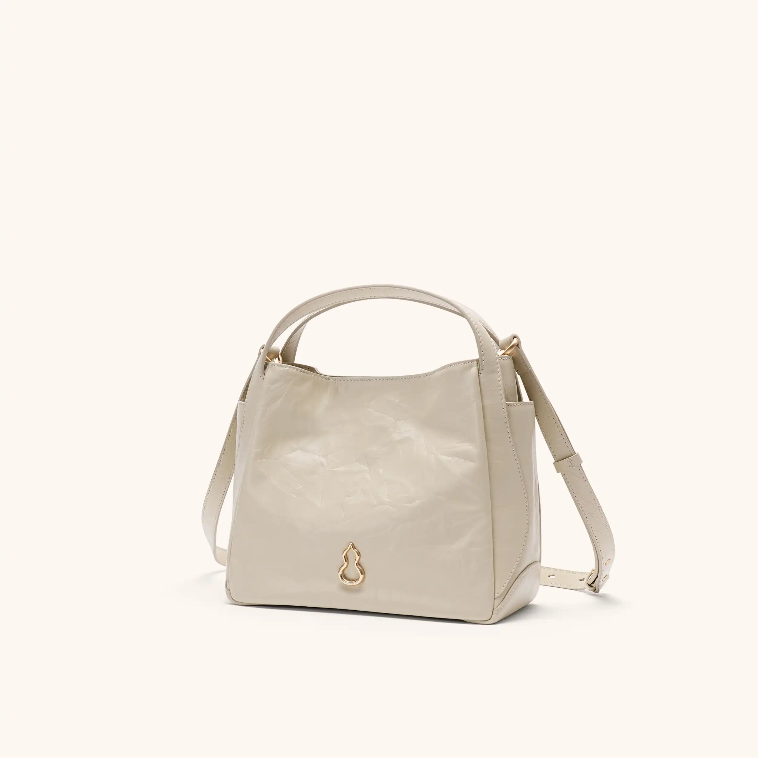 Side View of the Bampo Harmony Tote (Texture Version)#color_creamy-sand