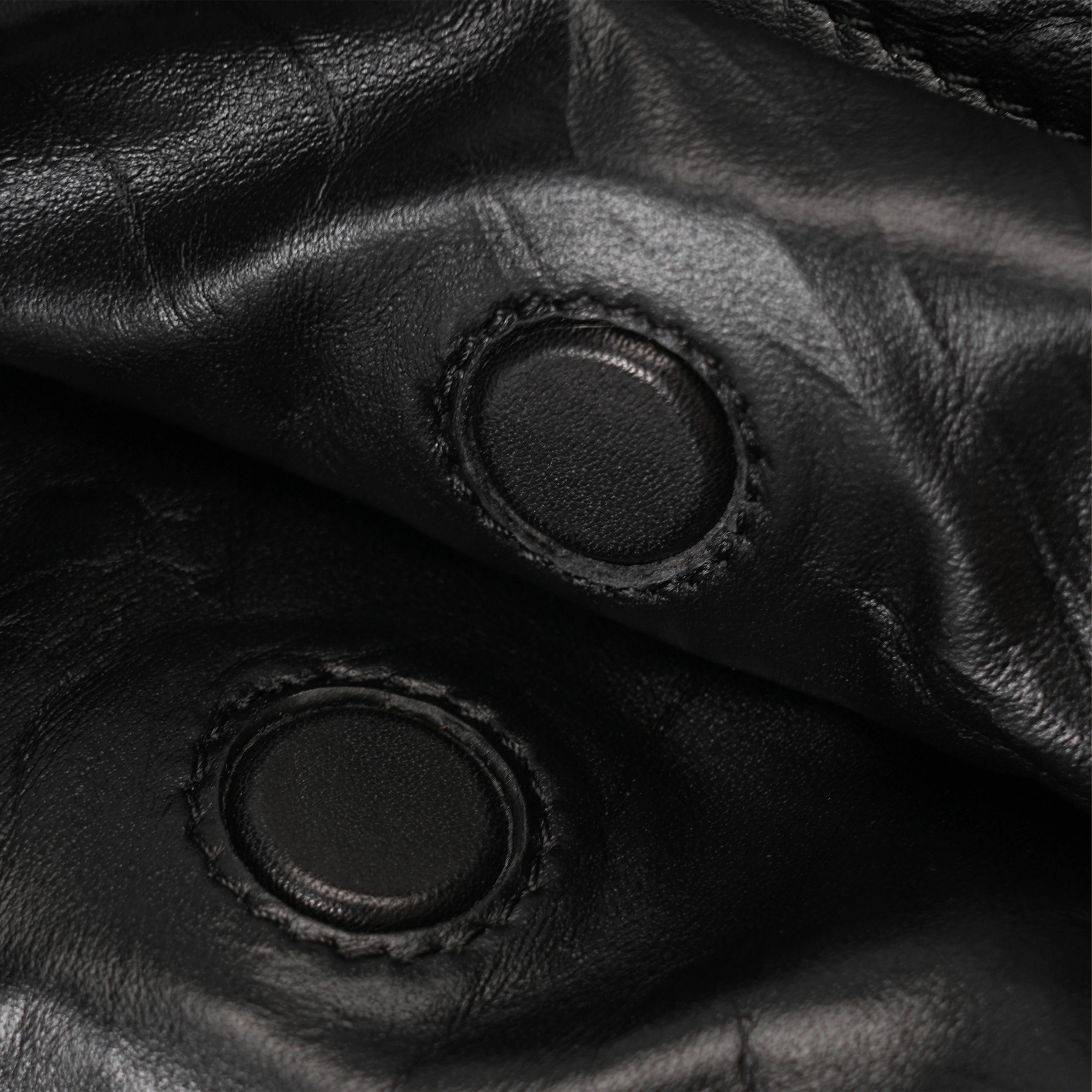 Magnetic snap closure of the Bampo Hoard Shoulder Bag