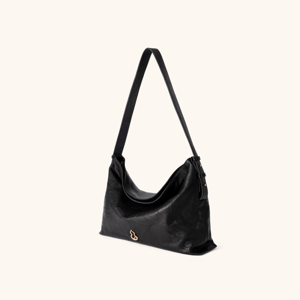 Side View of the Bampo Large Flow Hobo#color_glossy-black