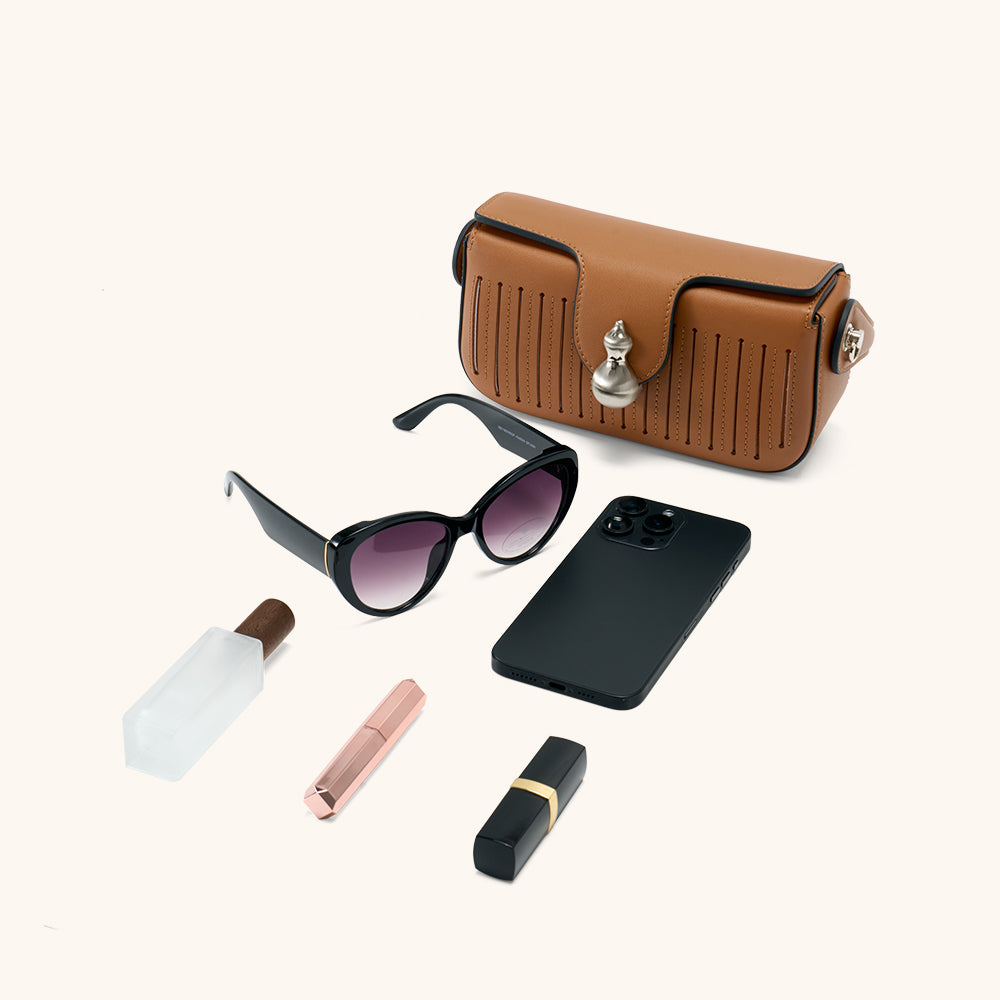 Items laid out to show Bampo Latch Boxy Bag