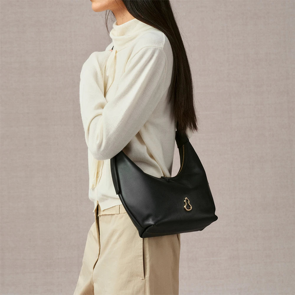 Bampo Small Flow Crescent Bag on Model 1