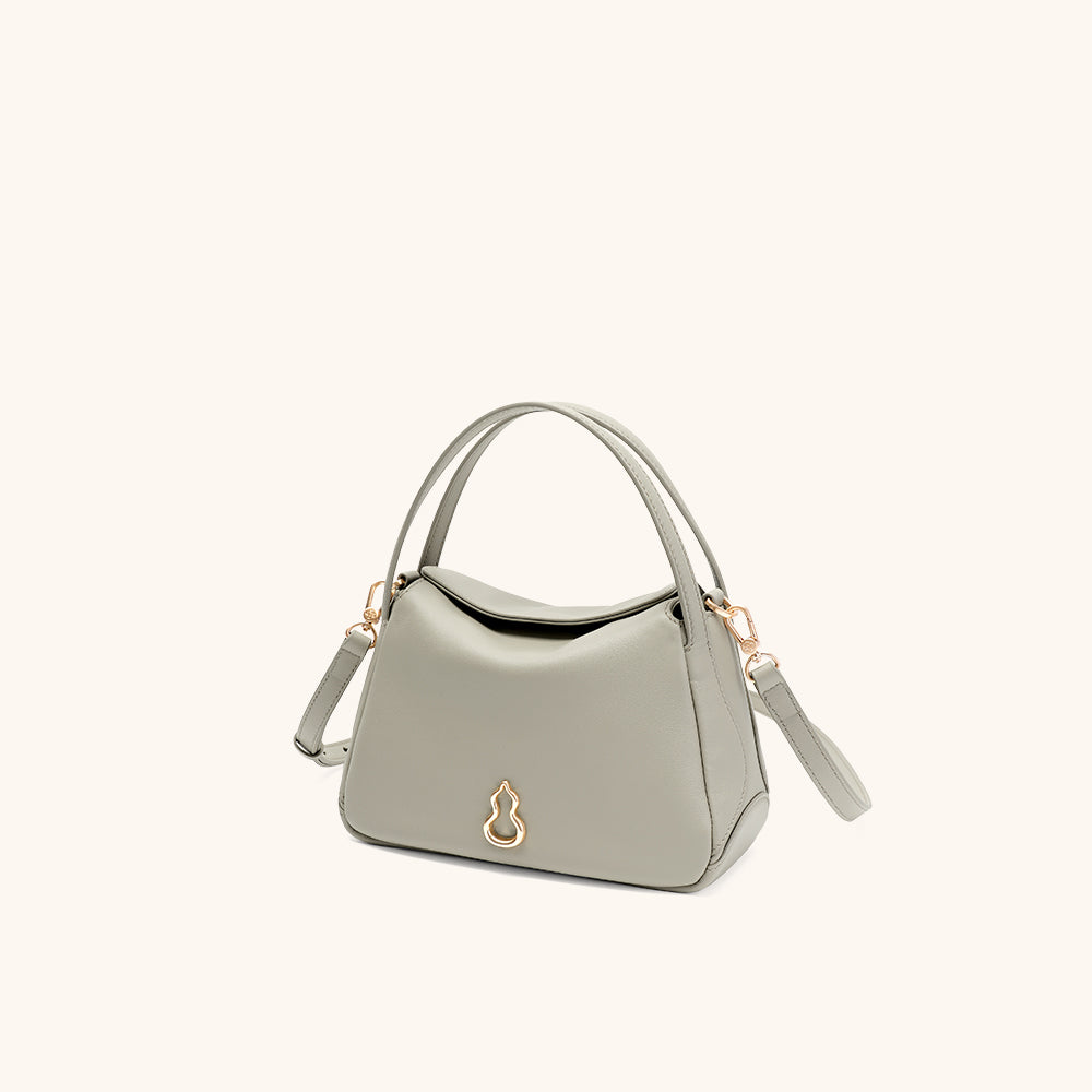 Side View of the Bampo Small Harmony Tote#color_warm-taupe