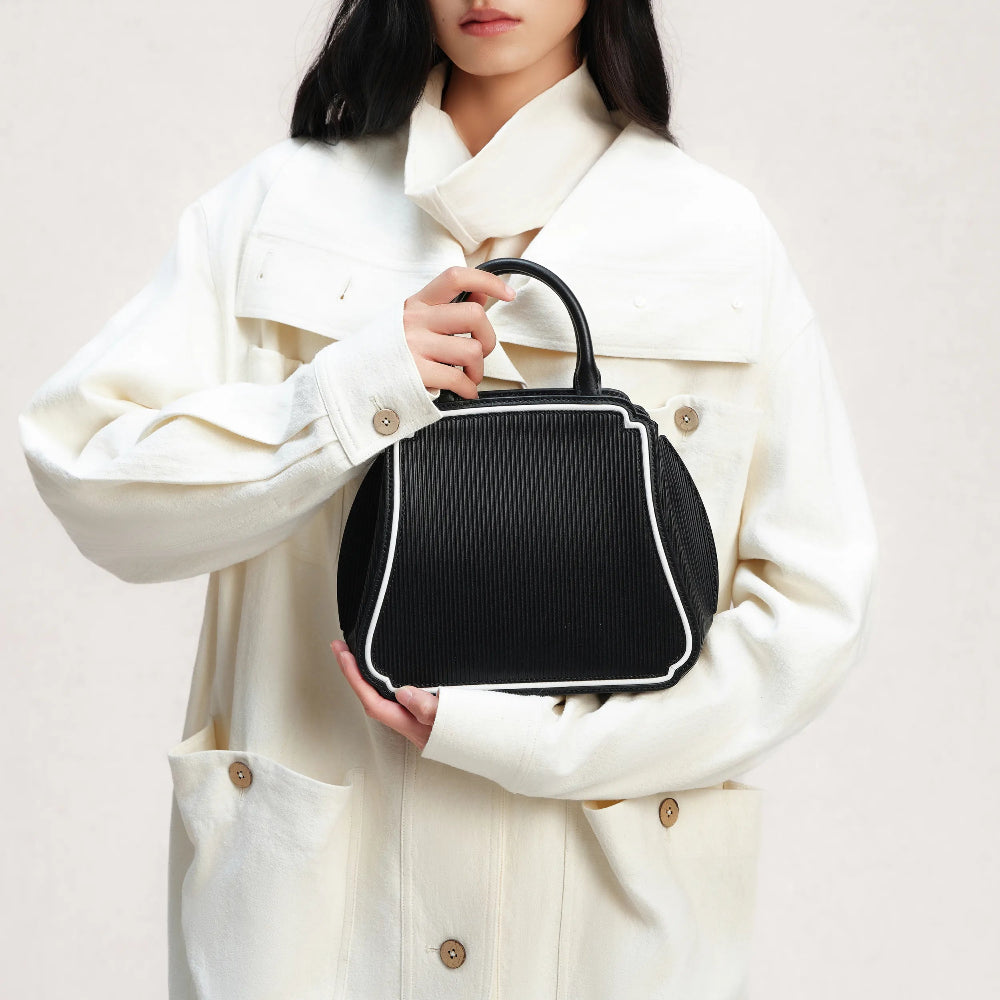 Bampo blank space handbag on model 1