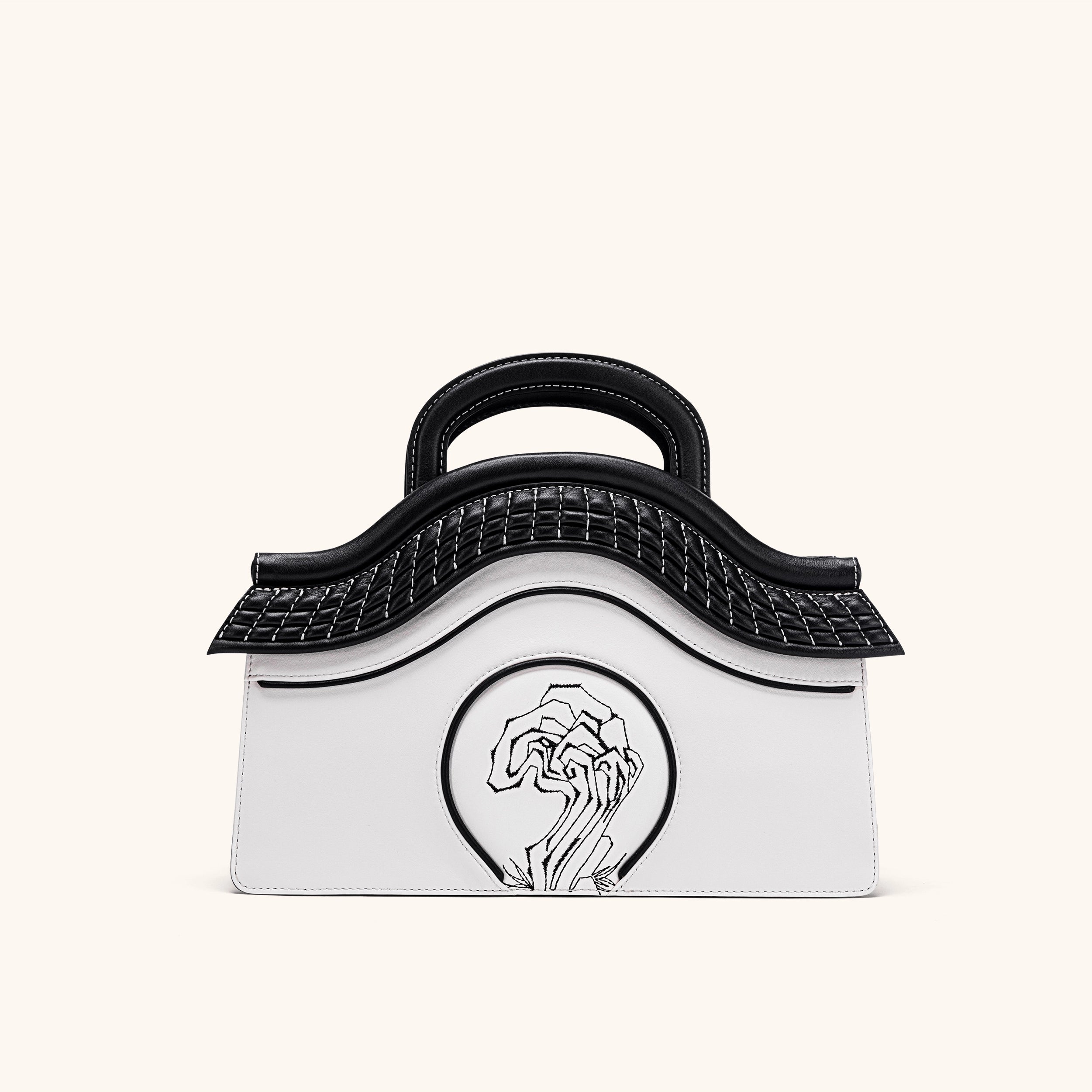 Black and white leather handbag | Bampo Garden of Pleasance