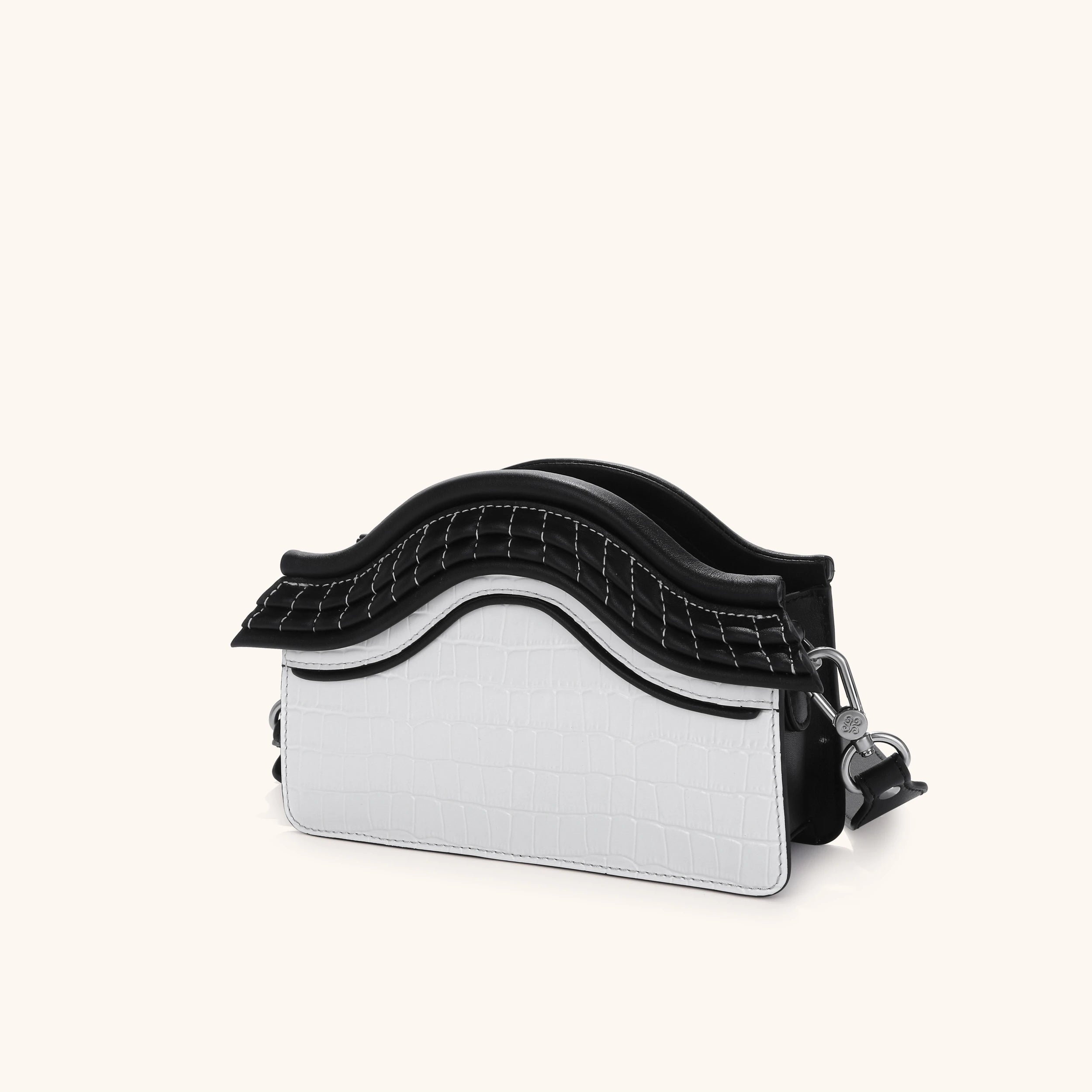 Side View of the Bampo garden of pleasance purse