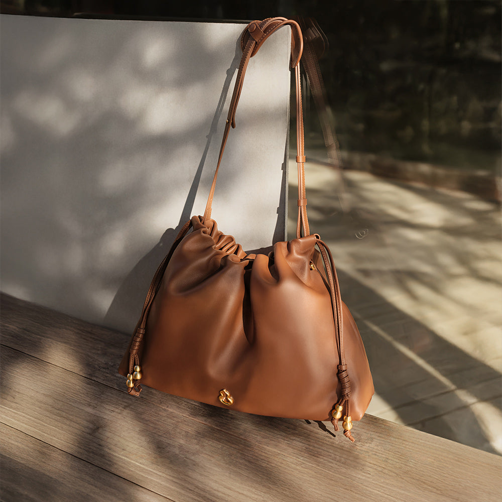 Why a Brown Leather Bag Is the New Wardrobe Essential