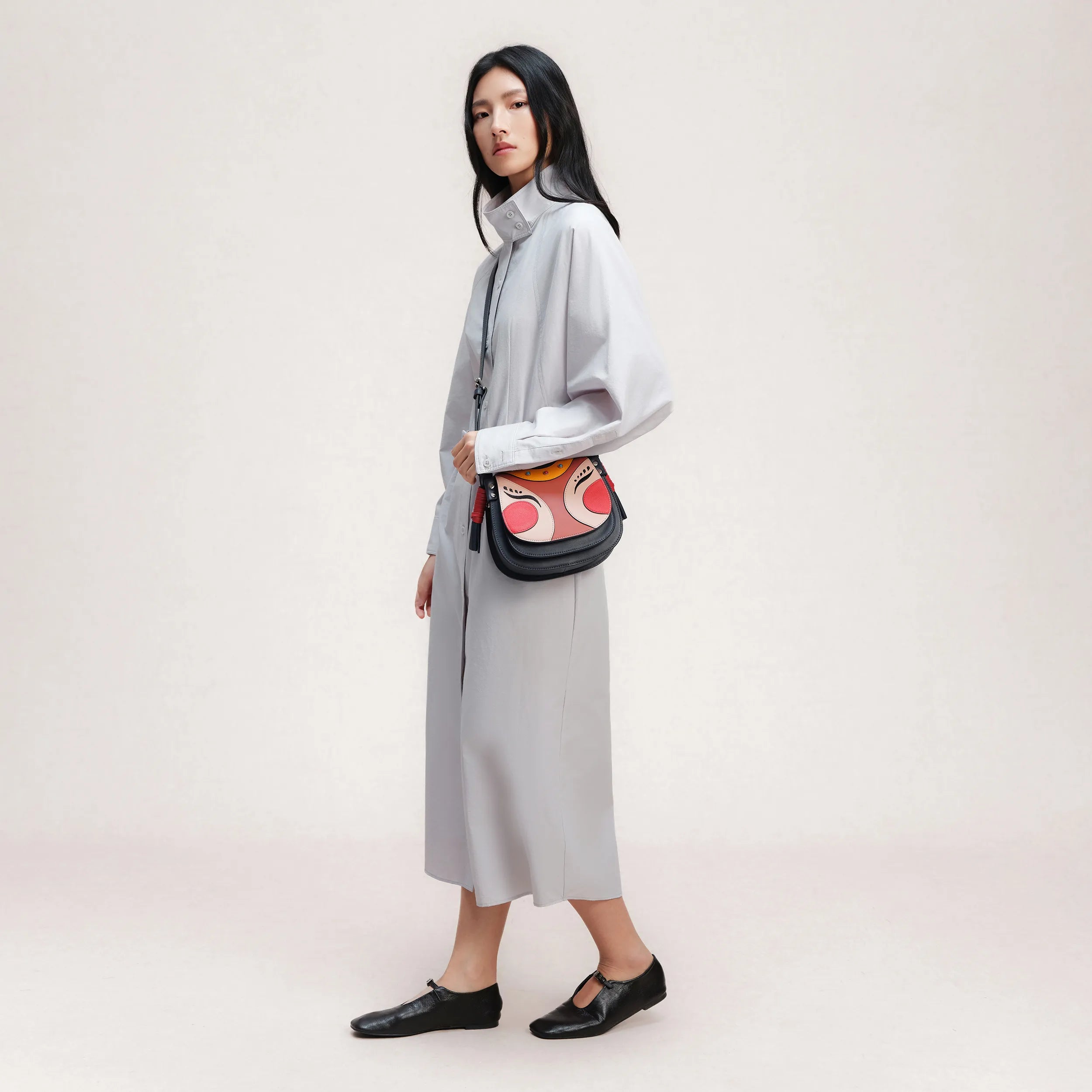 new year doll crossbody saddle bag | Bampo