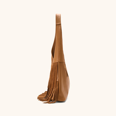 Side View of the Bampo Flow Double-Faced Fringe Bag#color_caramel
