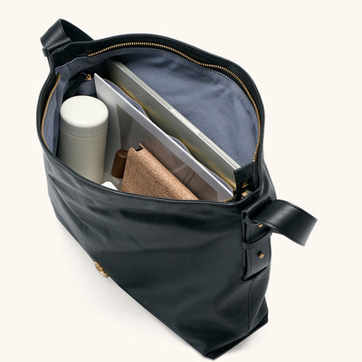 Items laid out to show Bampo Large Flow Hobo capacity