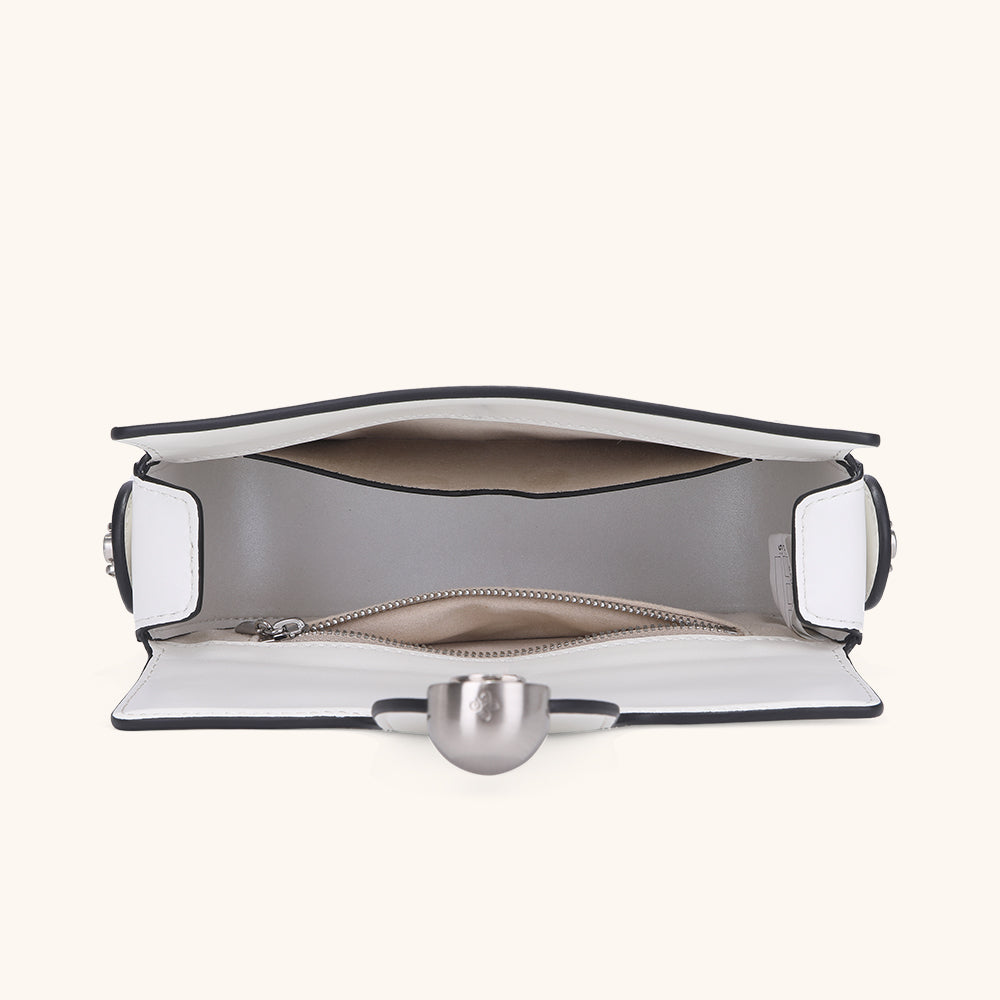 Items laid out to show Bampo Latch Boxy Bag