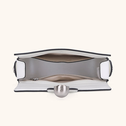 Items laid out to show Bampo Latch Boxy Bag