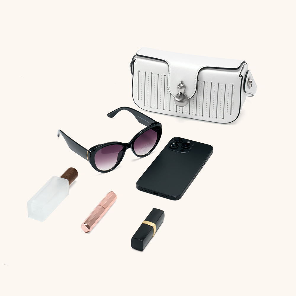 Items laid out to show Bampo Latch Boxy Bag