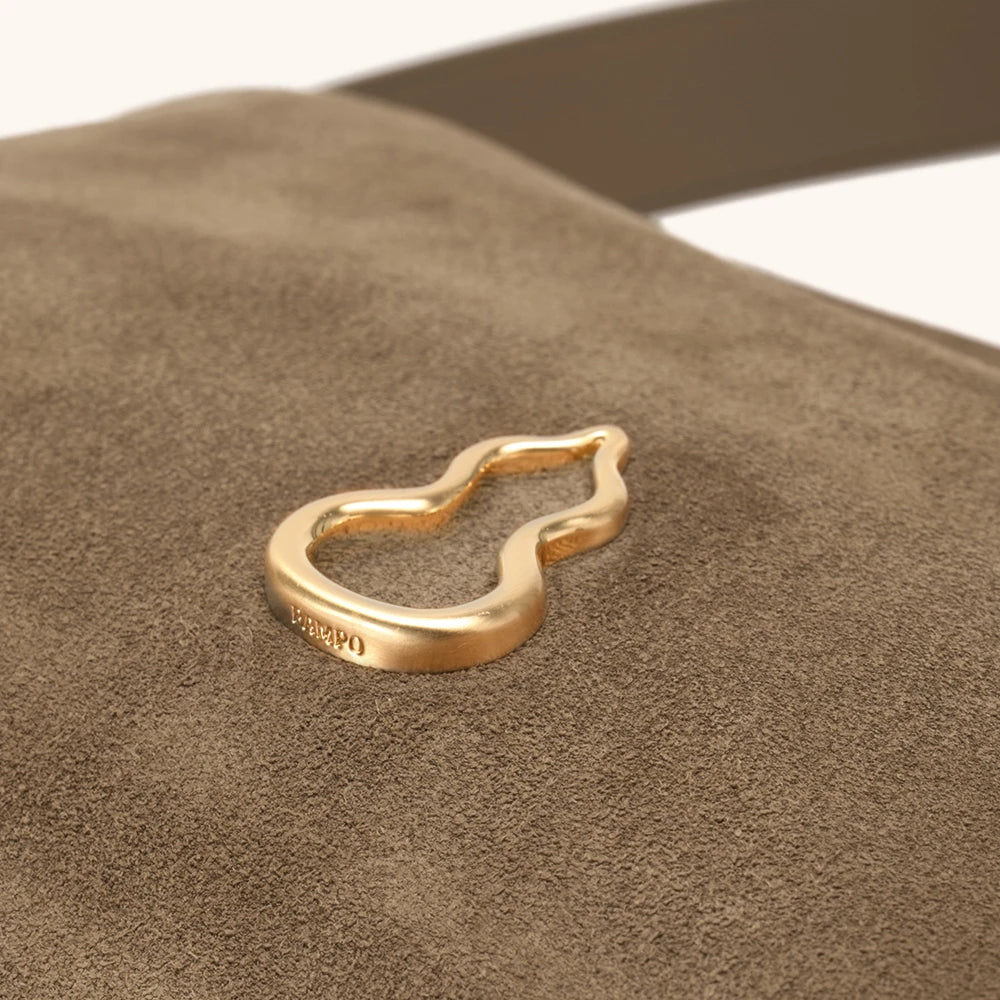 Hulu Hardware of the Bampo Medium Flow Hobo double faced suede