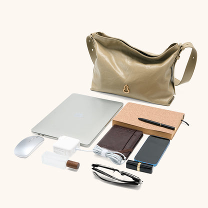 Items laid out to show Bampo Medium Flow Hobo capacity