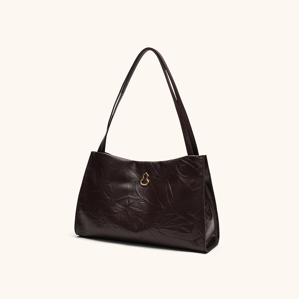 Side View of the Bampo Medium Land Tote (Texture Version)#color_plum-brown