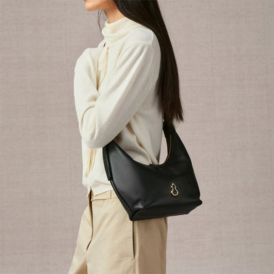 Bampo Small Flow Crescent Bag on Model 1