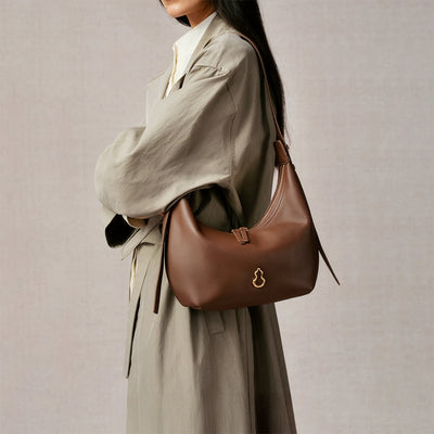 Bampo Small Flow Crescent Bag on Model 1