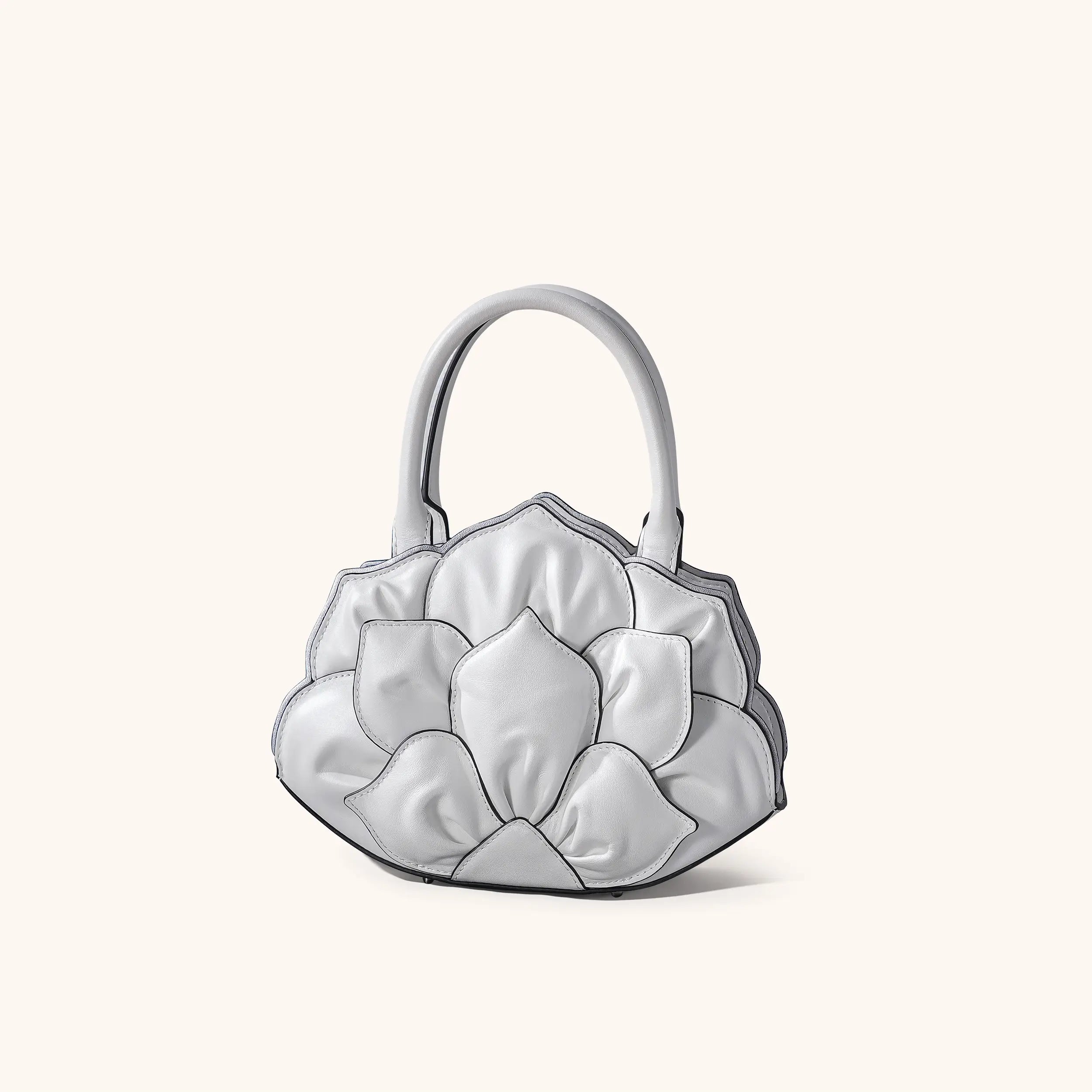 lotus handbag in white | Bampo